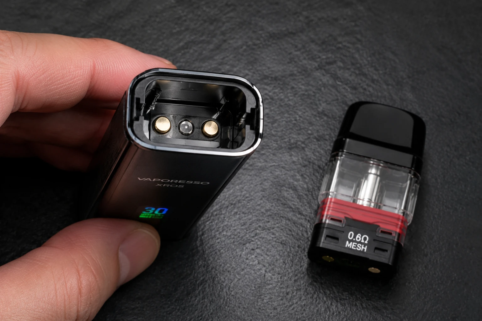 Interior view of Vaporesso XROS 6 pod slot demonstrating zero e-liquid leakage and clean magnetic pins